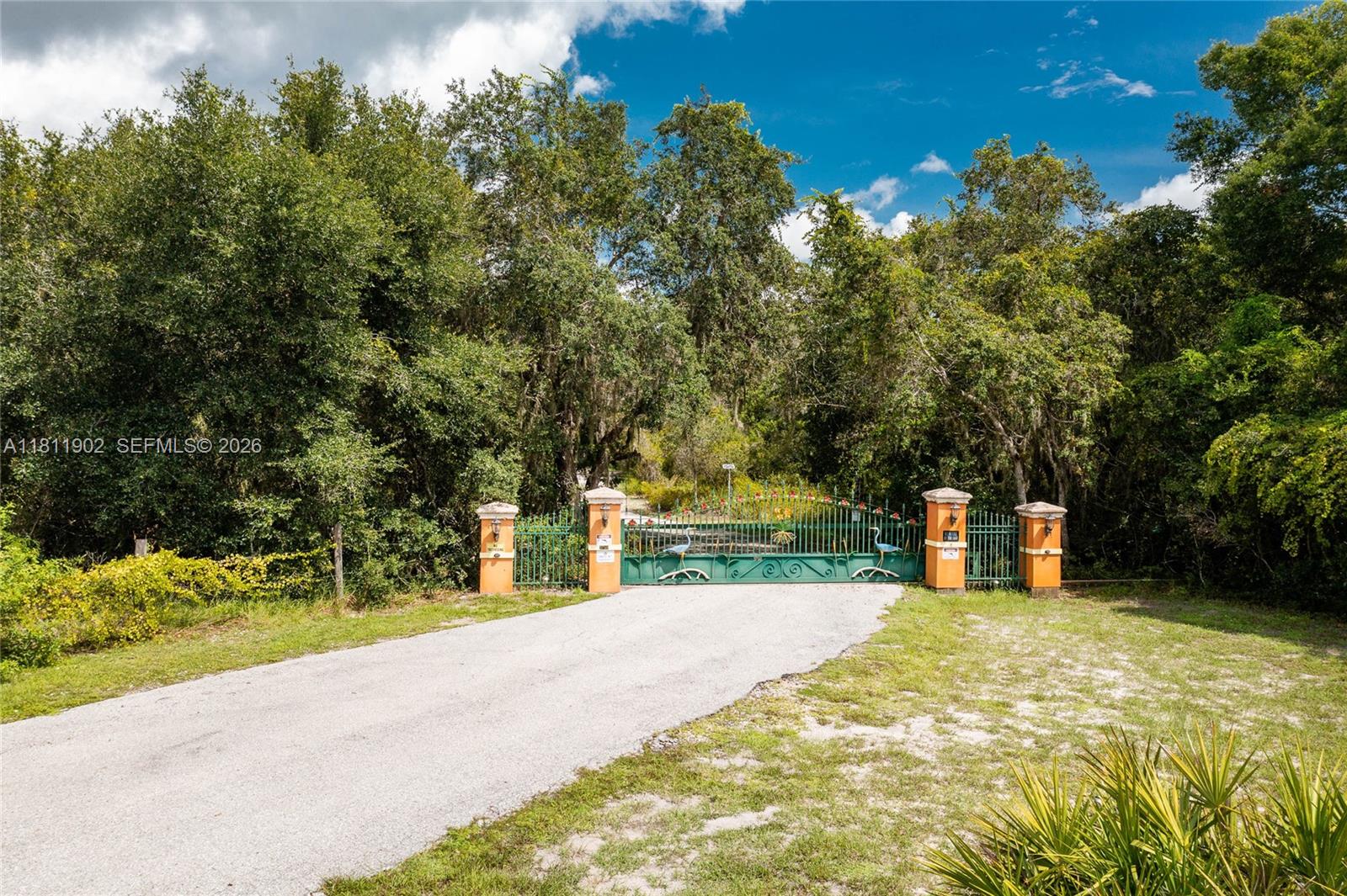 37511 Washington Loop Road Punta Gorda, FL 33982 - Photo 4 of 50 Front Gate