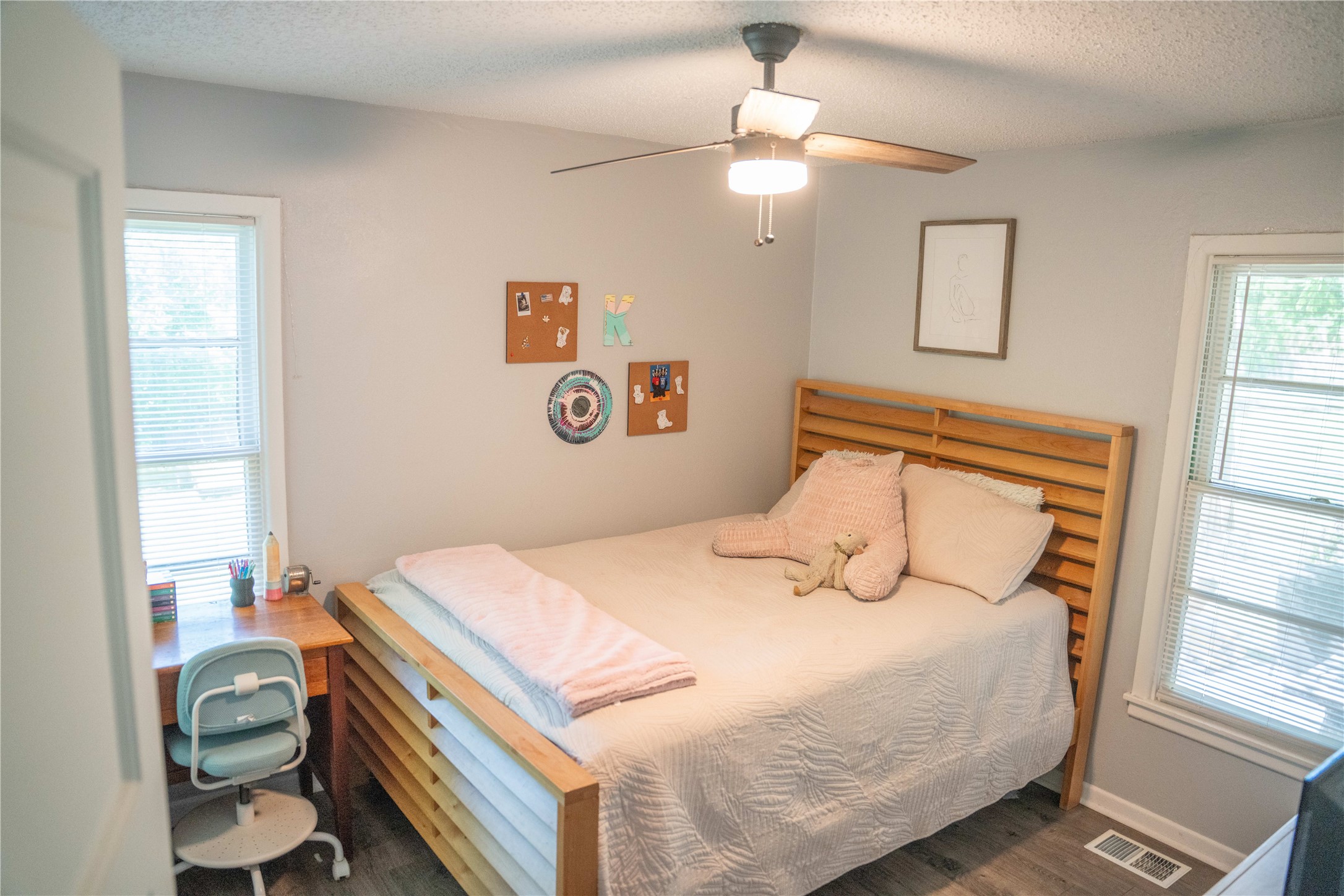 1120 Nix Road Lampasas, TX 76550 - Photo 15 of 31 a bedroom with a bed and a chandelier