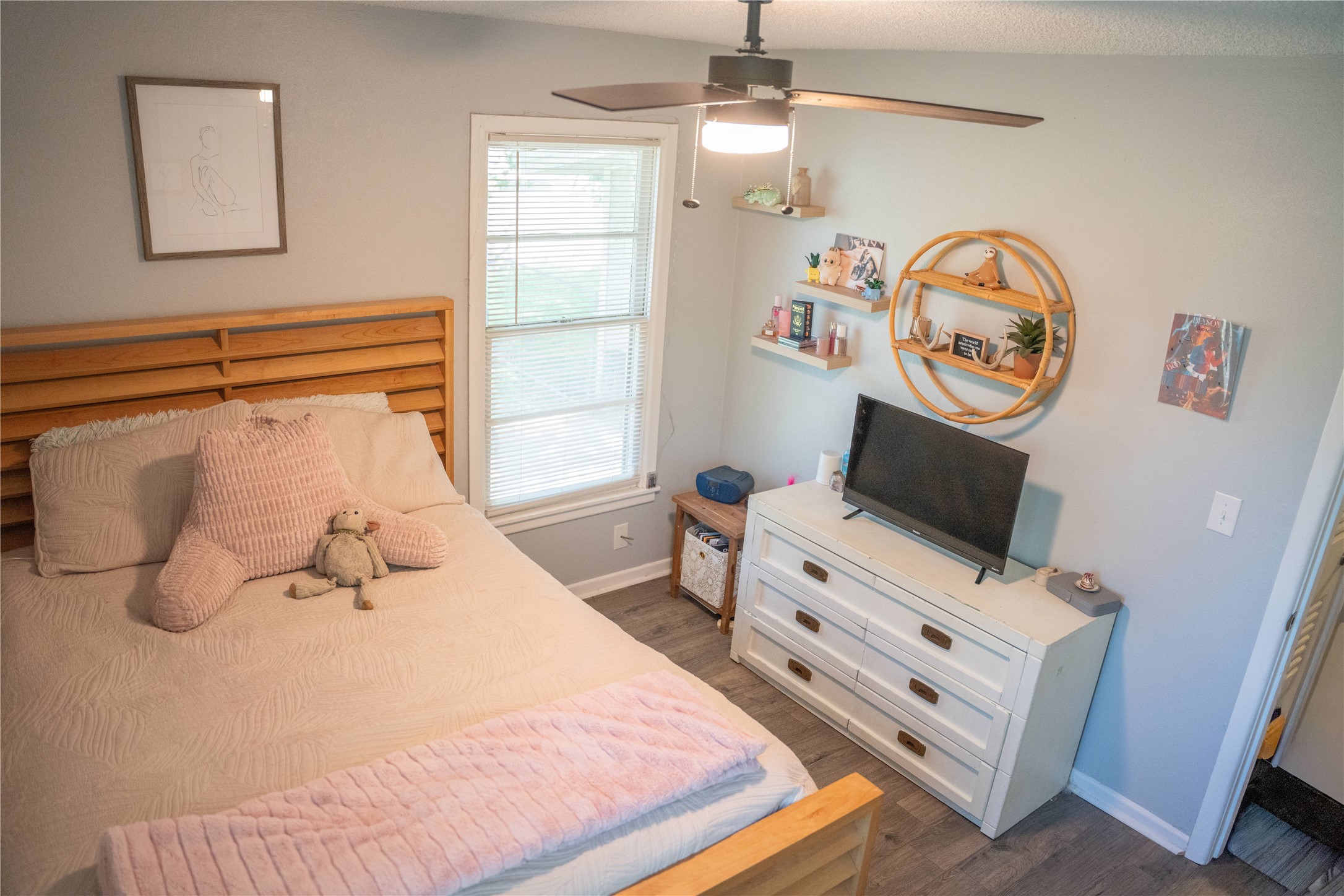 1120 Nix Road Lampasas, TX 76550 - Photo 17 of 31 a bedroom with a bed and a chandelier