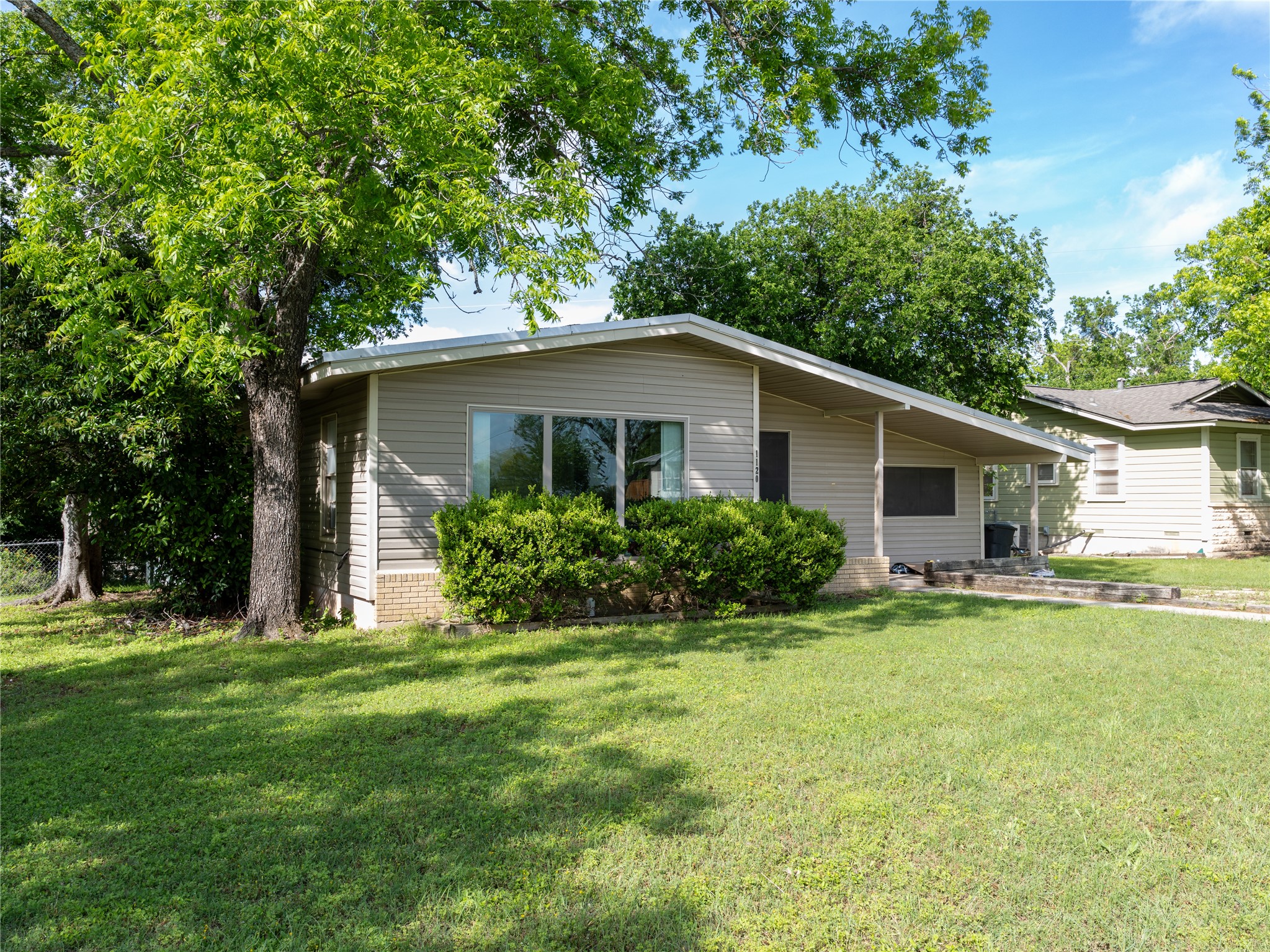 1120 Nix Road Lampasas, TX 76550 - Photo 2 of 31 a house that has a tree in front of it