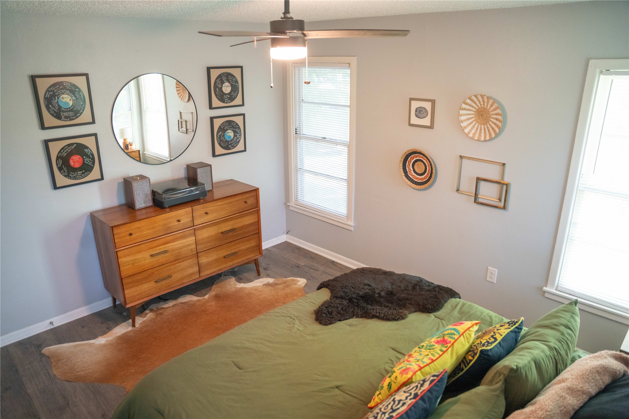 1120 Nix Road Lampasas, TX 76550 - Photo 21 of 31 a bedroom with a bed window and wall paintings