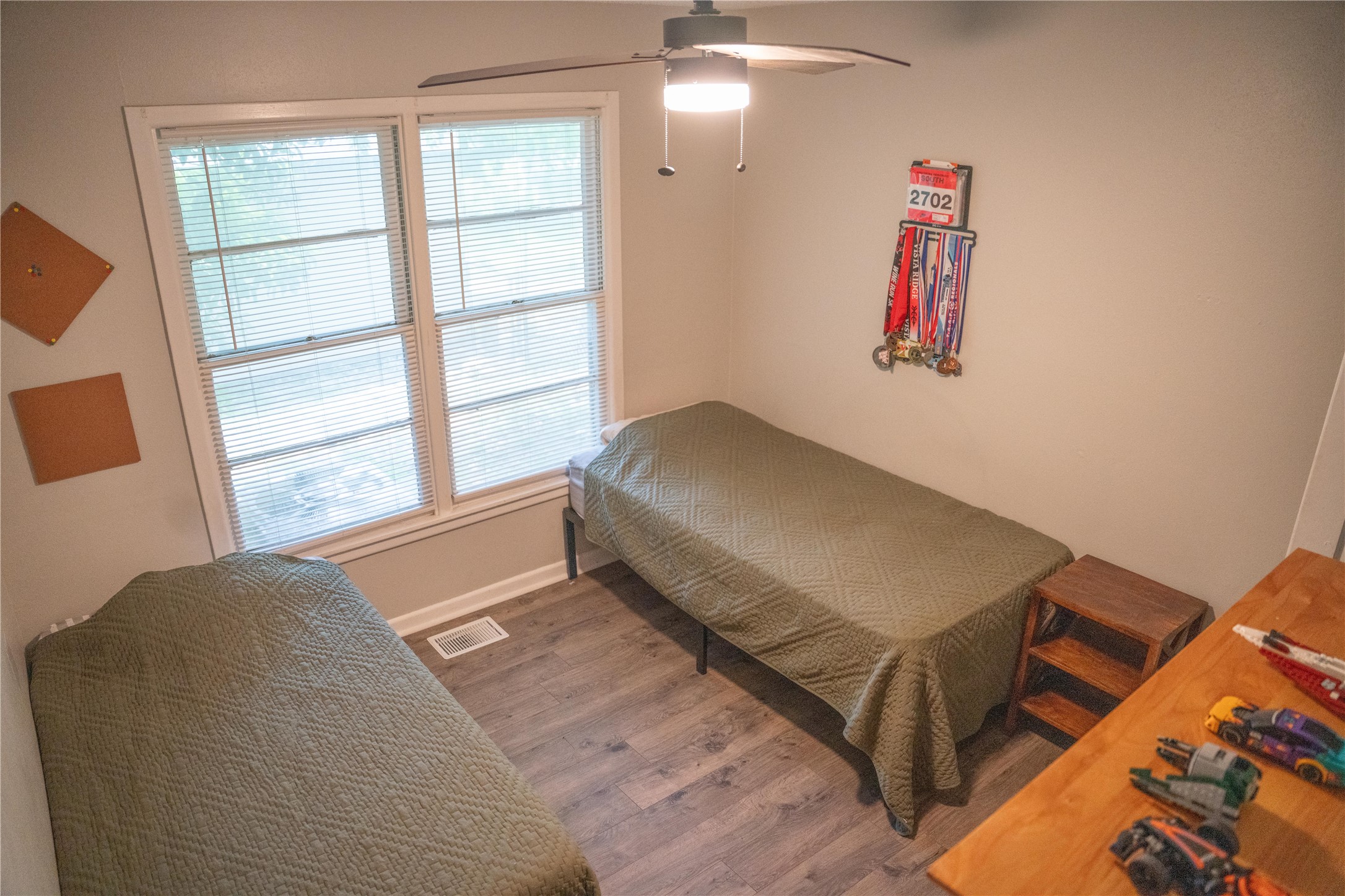 1120 Nix Road Lampasas, TX 76550 - Photo 24 of 31 a bedroom with a bed and a large window