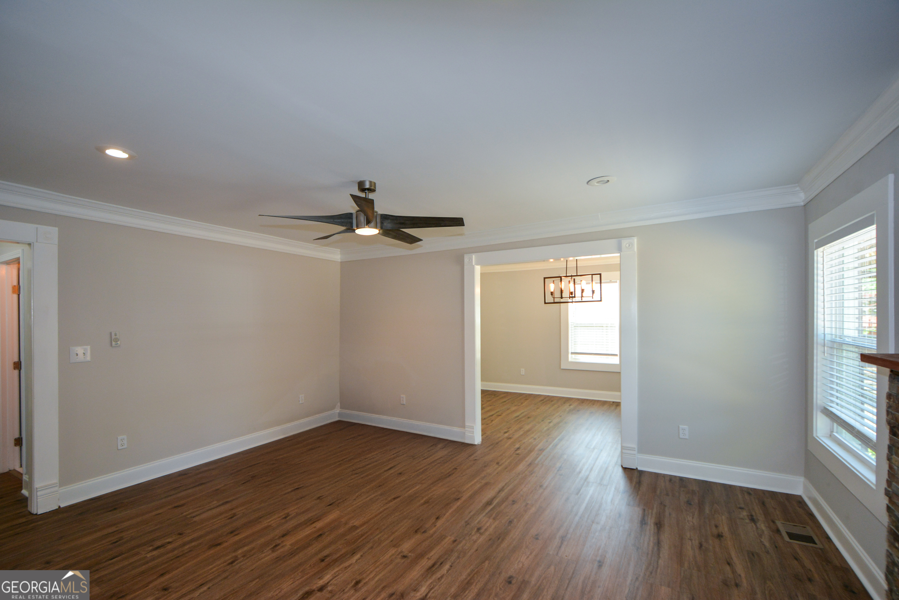 3164 Harris Drive East Point, GA 30344 - Photo 11 of 40 wooden floor in an empty room with a window
