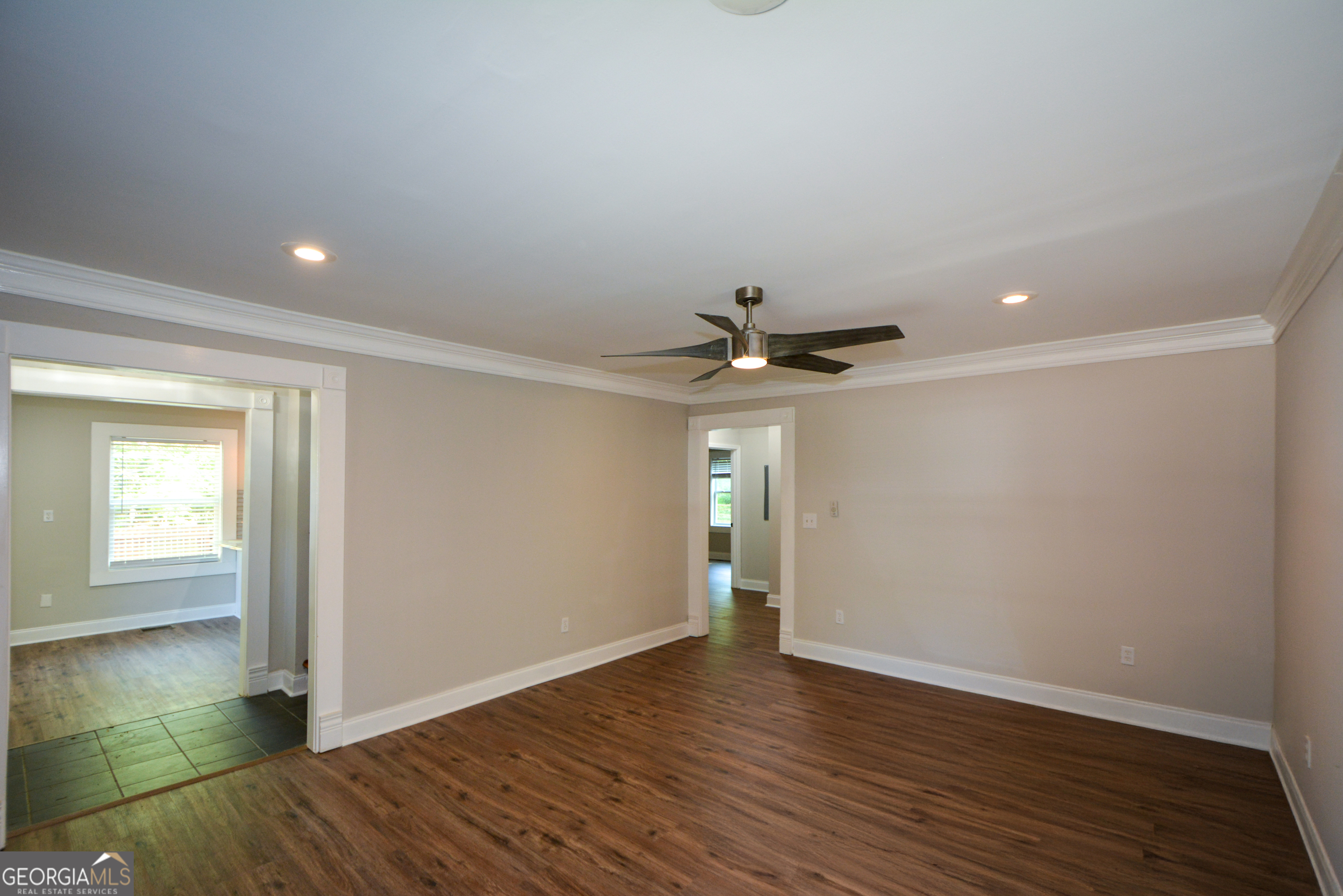 3164 Harris Drive East Point, GA 30344 - Photo 12 of 40 a view of an empty room with window and wooden floor