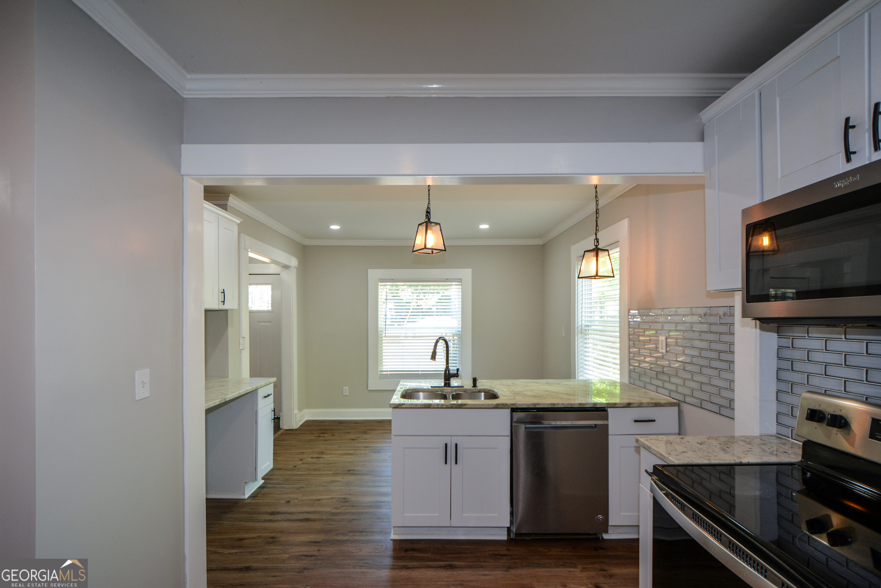 3164 Harris Drive East Point, GA 30344 - Photo 17 of 40 a kitchen with sink stove and refrigerator