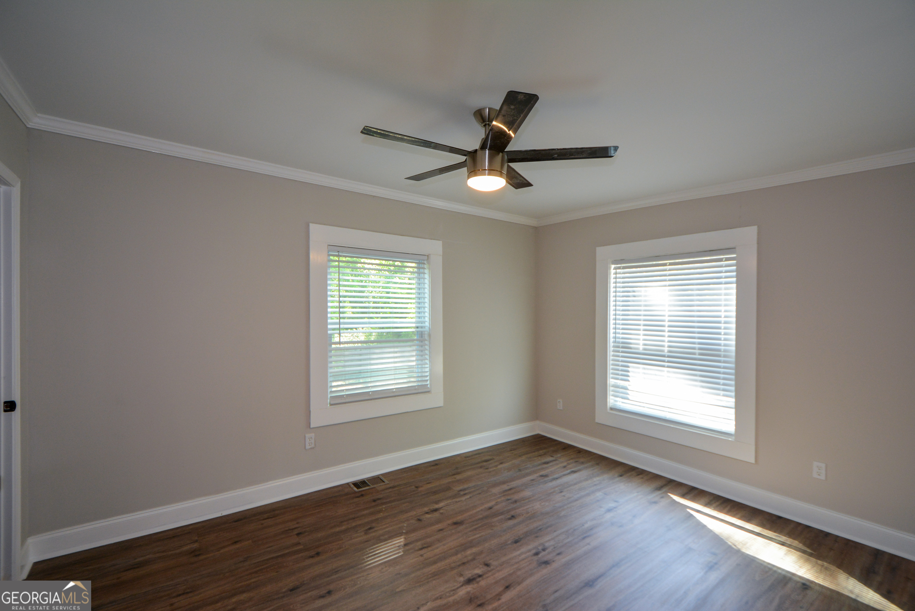 3164 Harris Drive East Point, GA 30344 - Photo 27 of 40 a view of an empty room with wooden floor and a window