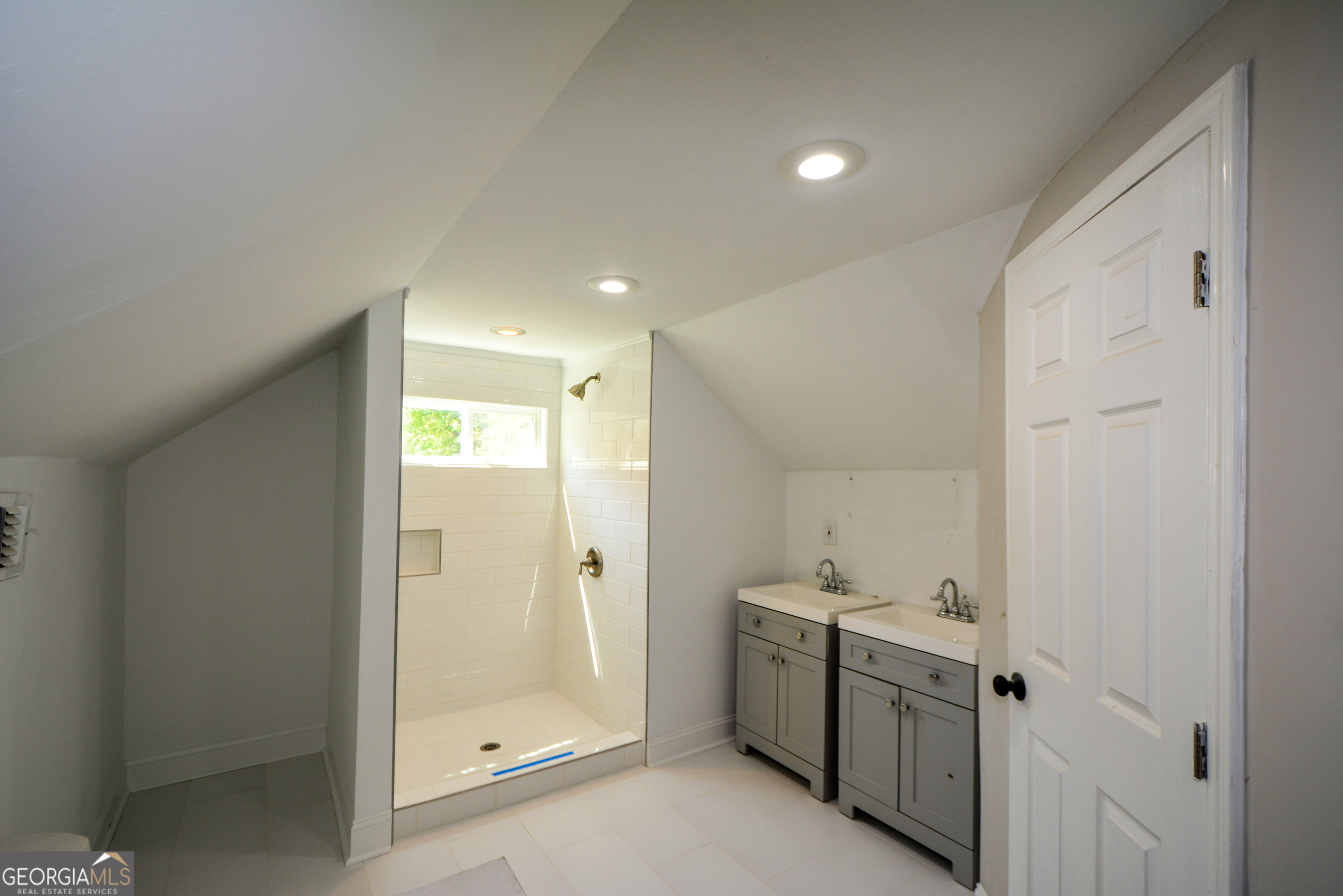3164 Harris Drive East Point, GA 30344 - Photo 31 of 40 a bathroom with a shower and a sink