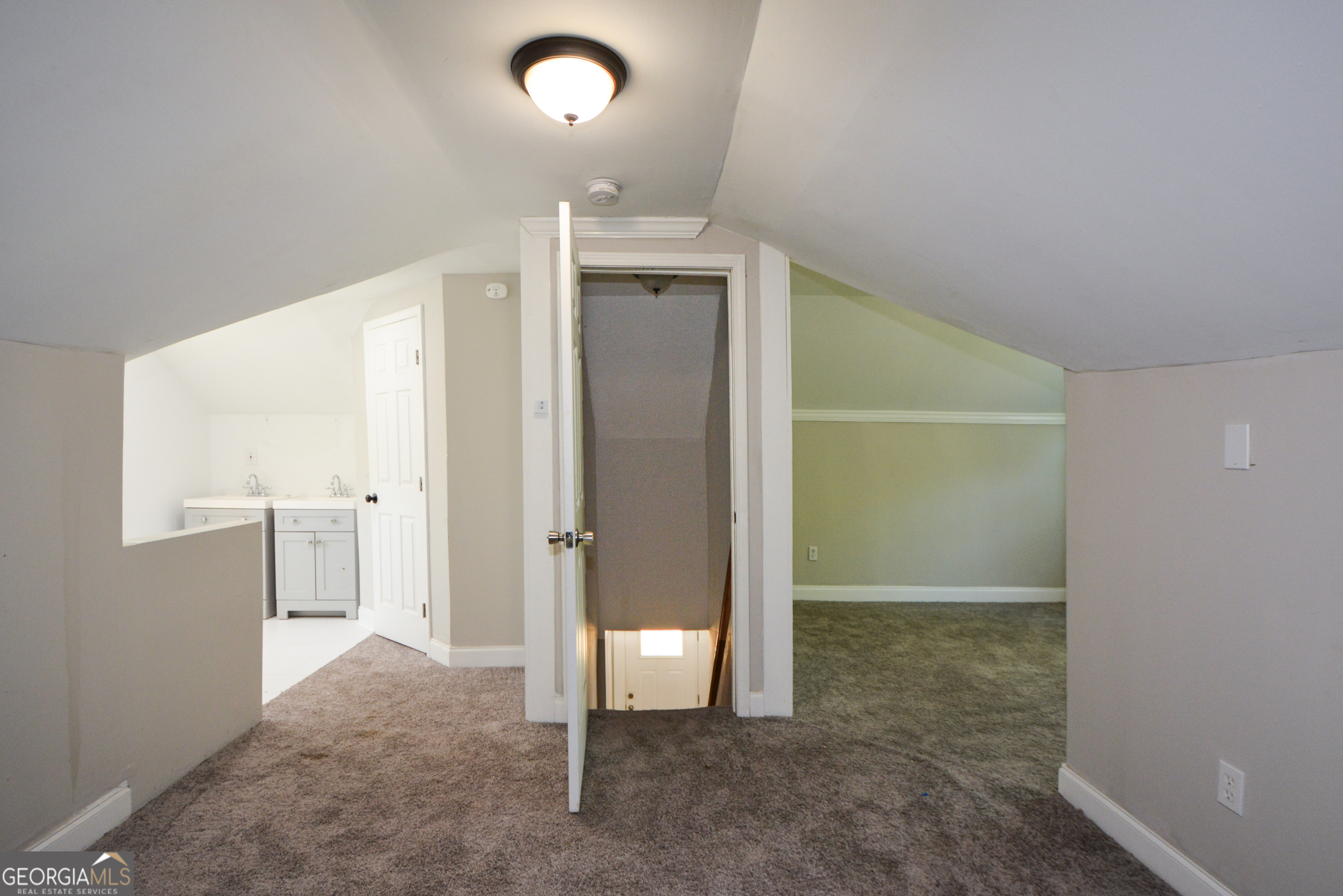 3164 Harris Drive East Point, GA 30344 - Photo 33 of 40 an empty room with a bathroom and a sink
