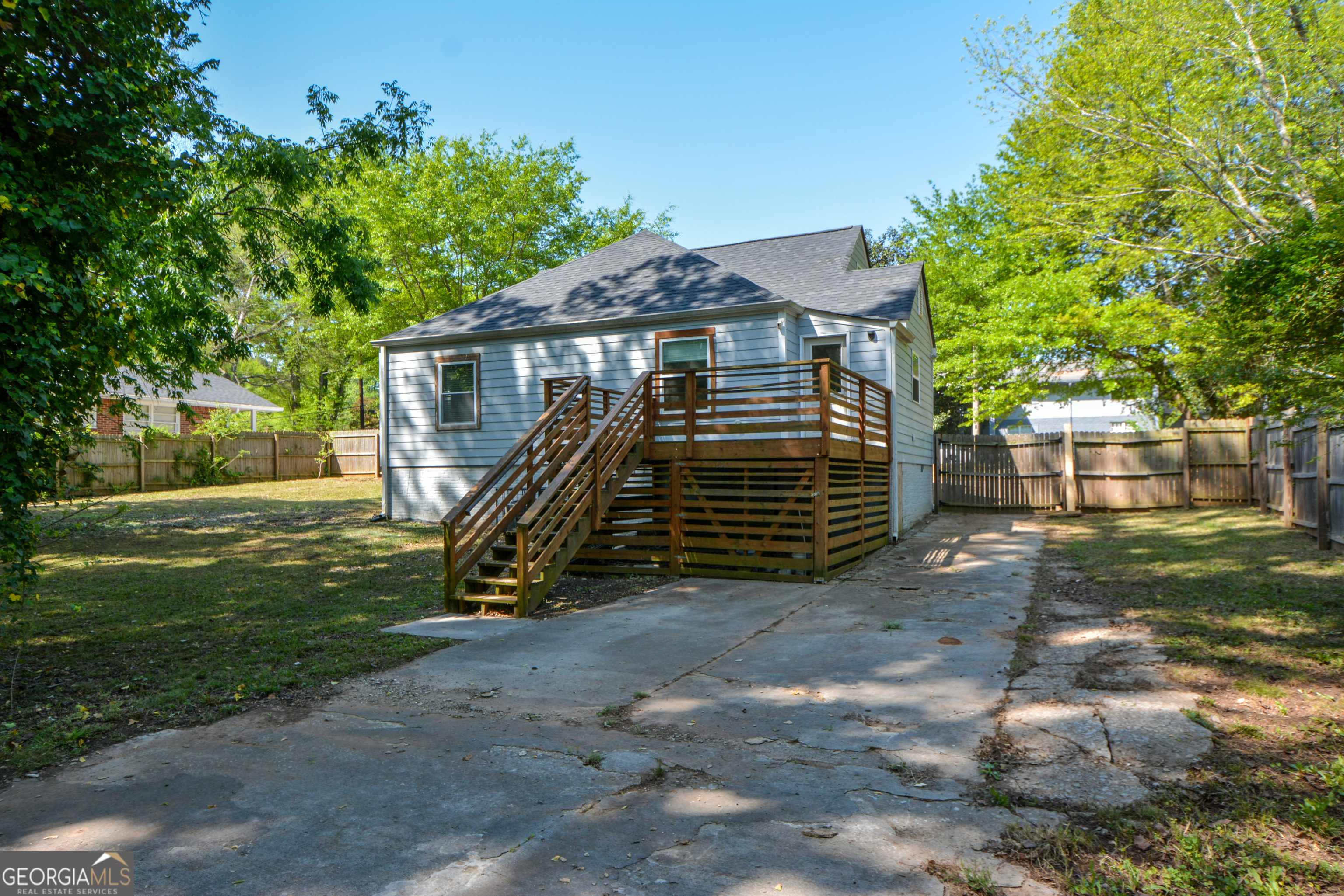 3164 Harris Drive East Point, GA 30344 - Photo 37 of 40 a view of a house with a yard