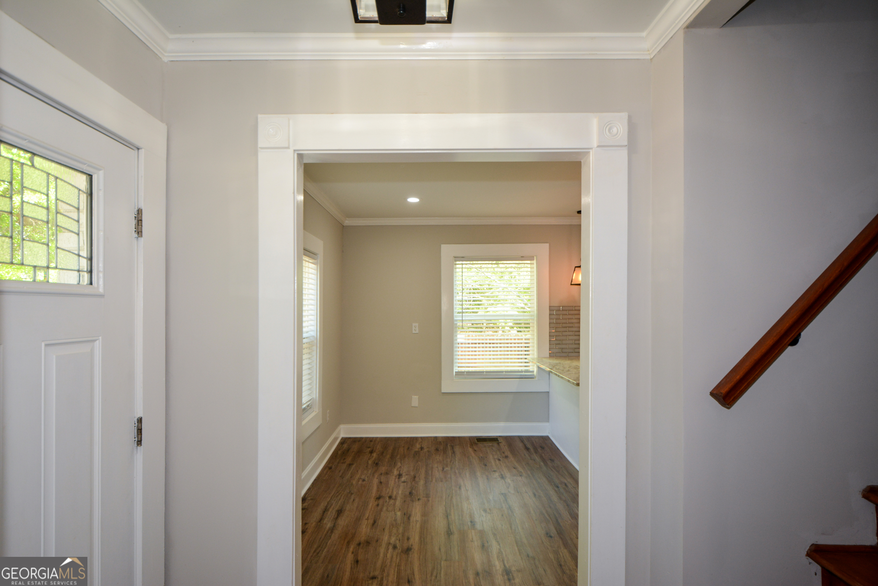 3164 Harris Drive East Point, GA 30344 - Photo 7 of 40 a view of an empty room with wooden floor and a window