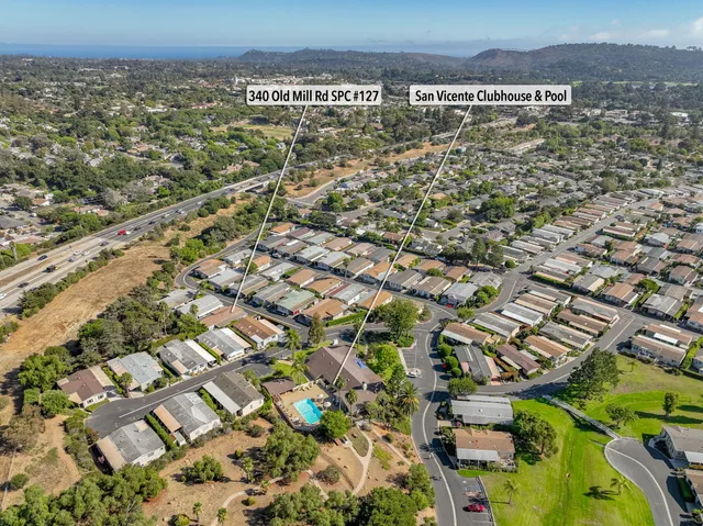 an aerial view of residential building and lake view
