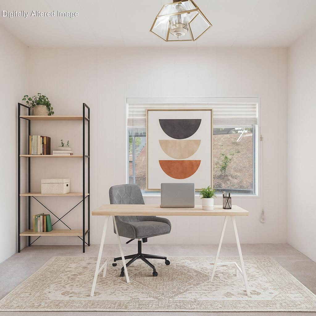 340 Old Mill Road, Unit 127 Santa Barbara, CA 93110 - Photo 11 of 33 a living room with furniture a rug and a painting on the wall