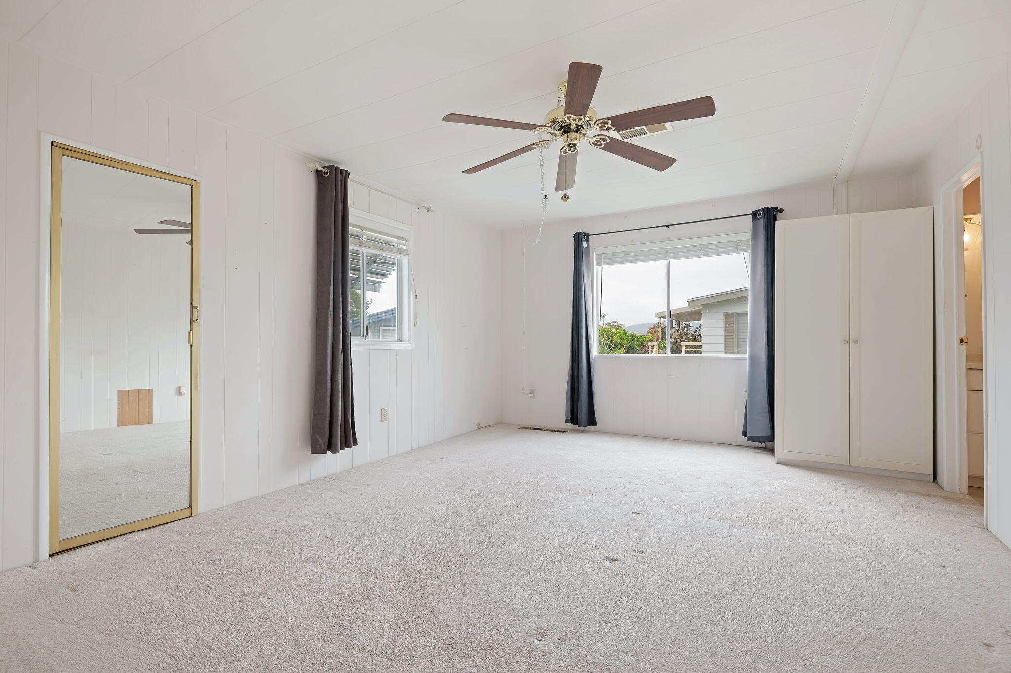 340 Old Mill Road, Unit 127 Santa Barbara, CA 93110 - Photo 19 of 33 a view of a big room with closet and windows