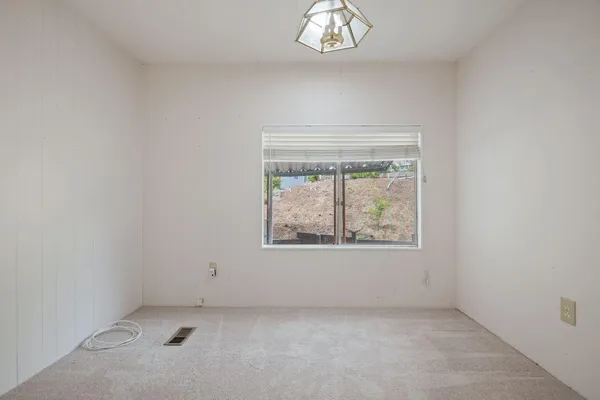 an empty room with a window