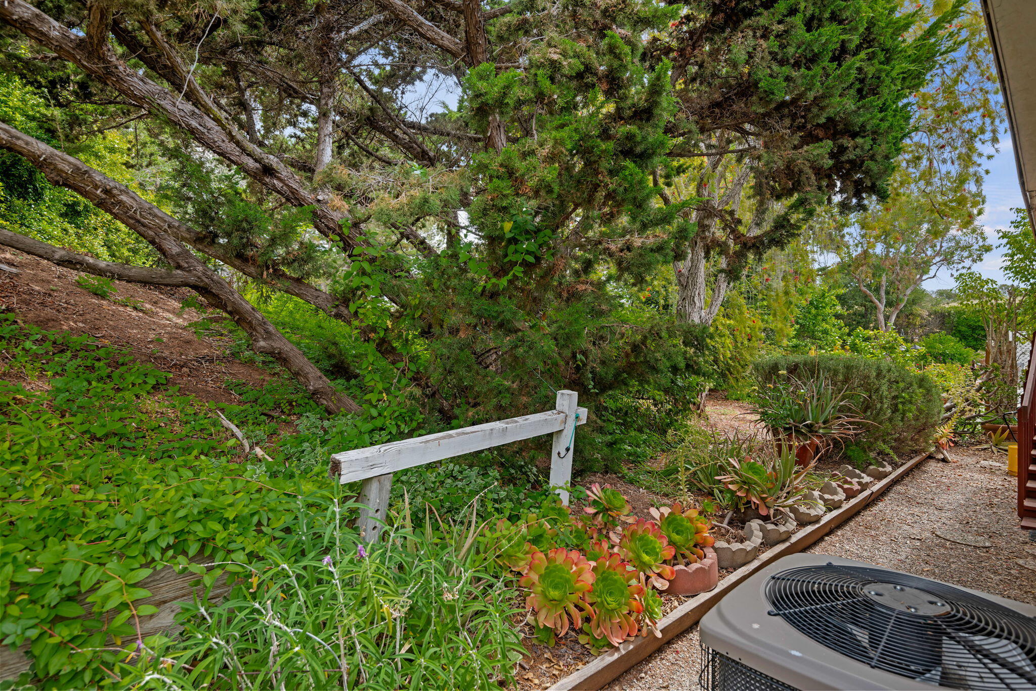 340 Old Mill Road, Unit 127 Santa Barbara, CA 93110 - Photo 32 of 33 a view of a garden with an outdoor space