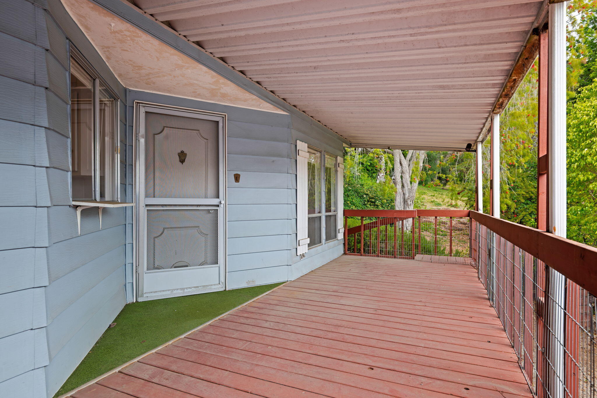 340 Old Mill Road, Unit 127 Santa Barbara, CA 93110 - Photo 4 of 33 a view of a balcony with wooden floor