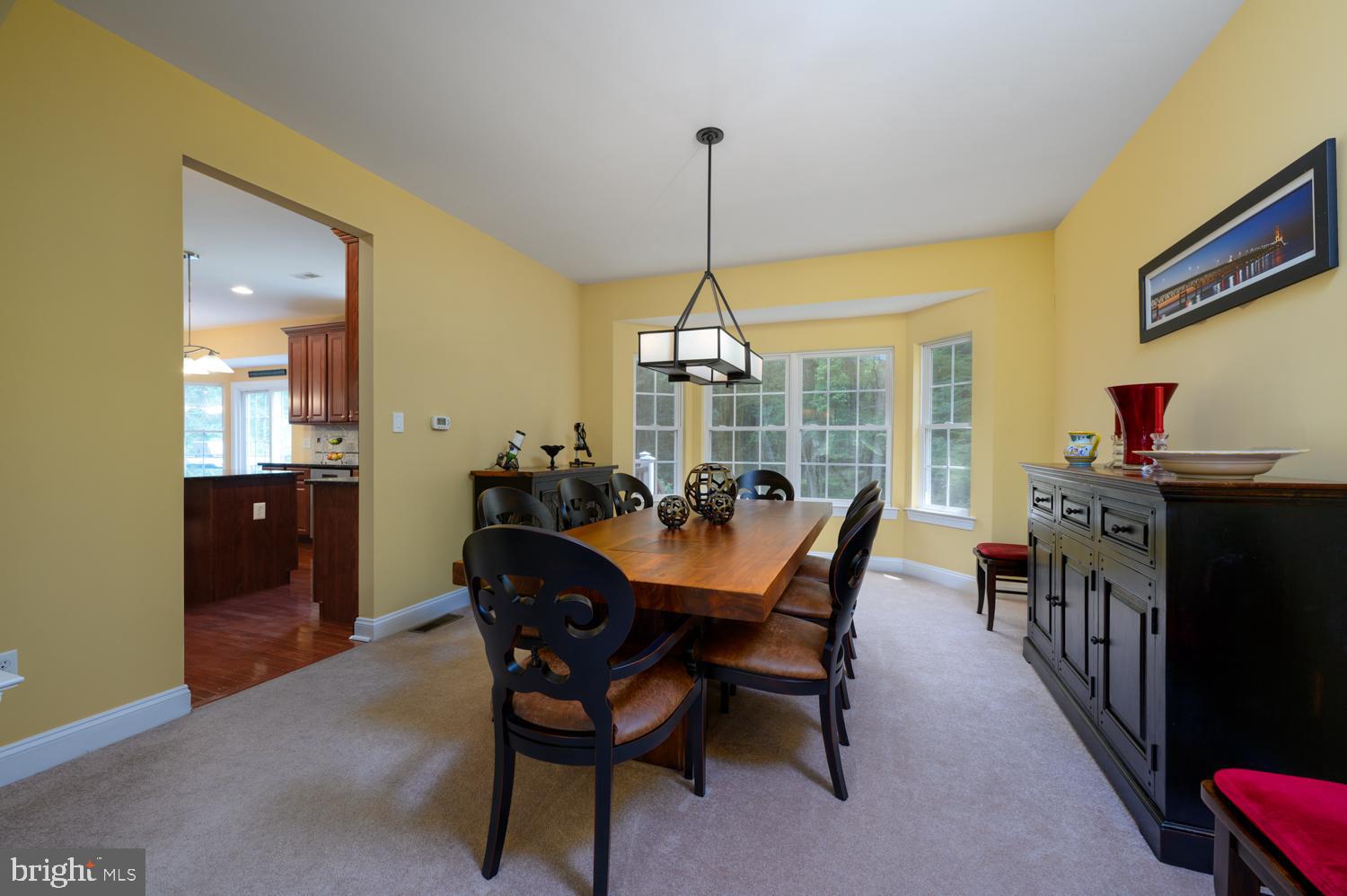 11 Gaskill Road Mount Laurel, NJ 08054 - Photo 15 of 56 a view of a dining room and livingroom with furniture wooden floor a chandelier