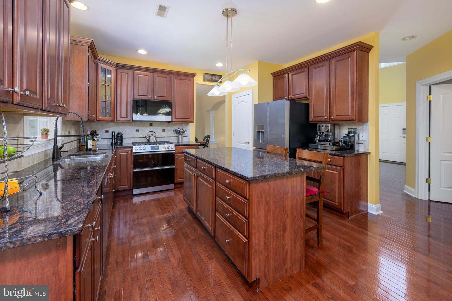 11 Gaskill Road Mount Laurel, NJ 08054 - Photo 20 of 56 a kitchen with stainless steel appliances granite countertop wooden cabinets a sink dishwasher a refrigerator and a stove