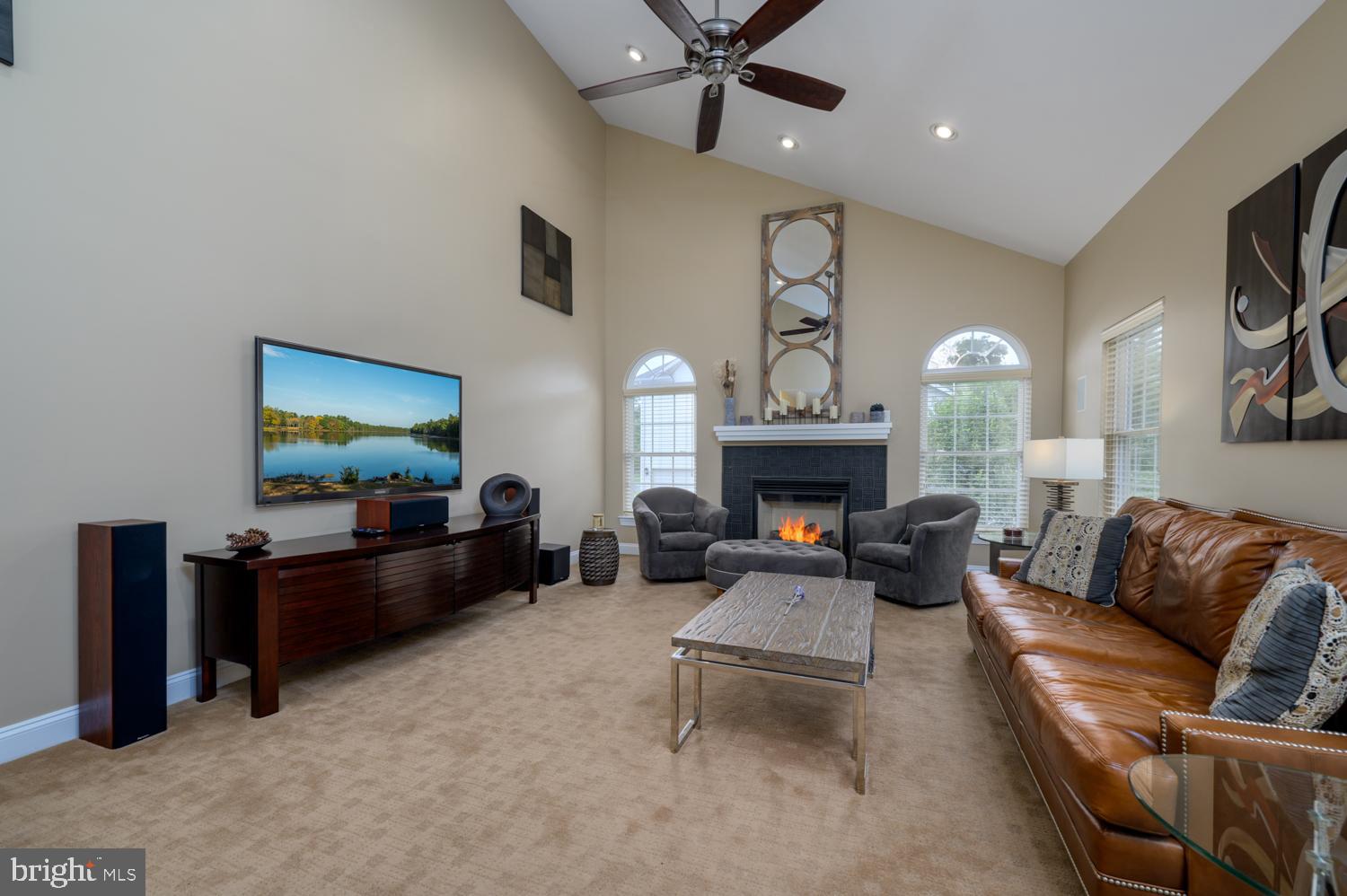 11 Gaskill Road Mount Laurel, NJ 08054 - Photo 25 of 56 a living room with furniture and a flat screen tv