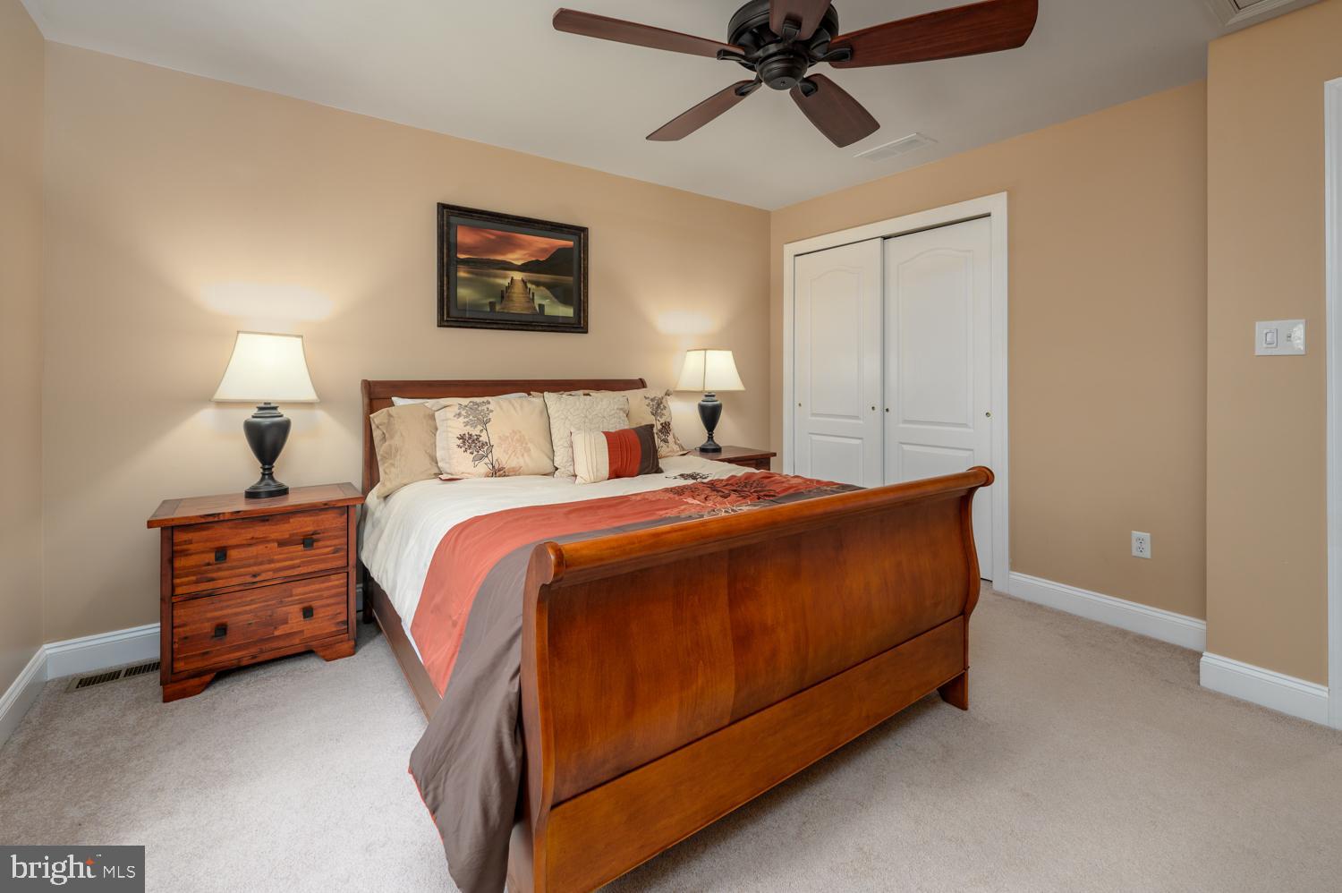 11 Gaskill Road Mount Laurel, NJ 08054 - Photo 36 of 56 a bed room with a bed and a lamp