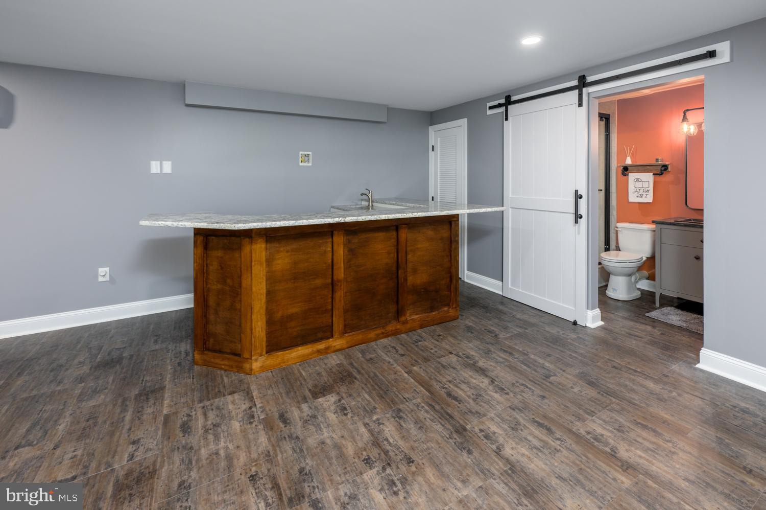 11 Gaskill Road Mount Laurel, NJ 08054 - Photo 39 of 56 a view of a room with wooden floor and a sink