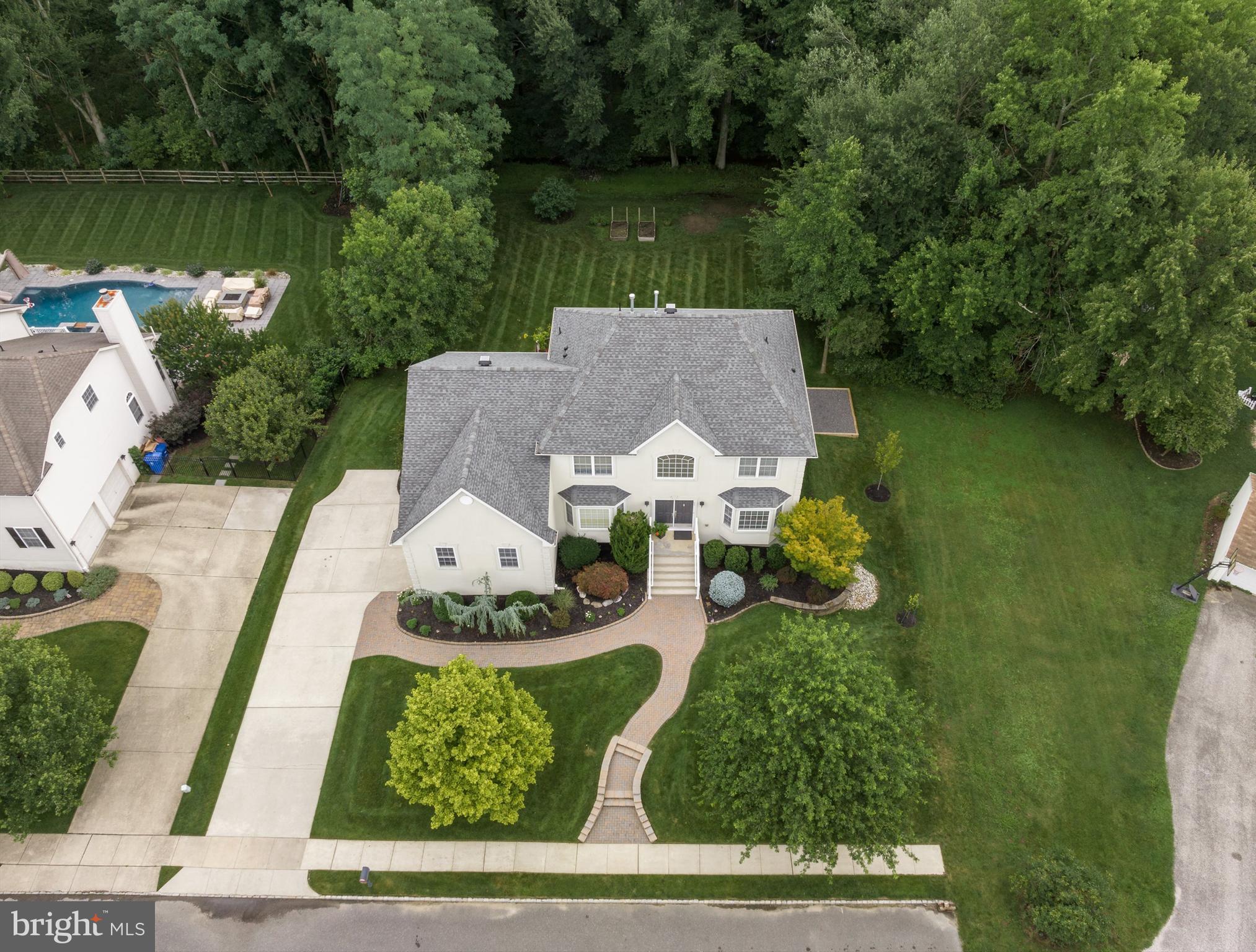 11 Gaskill Road Mount Laurel, NJ 08054 - Photo 6 of 56 an aerial view of a house with a garden and lake view