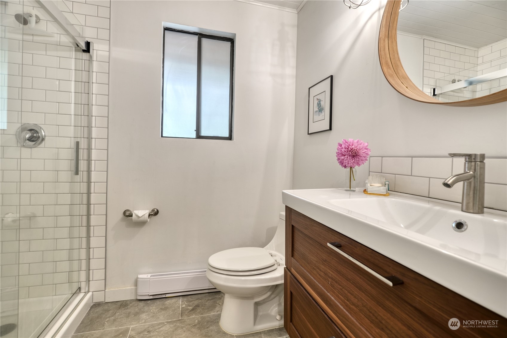 1976 Johnson Road Point Roberts, WA 98281 - Photo 14 of 22 a bathroom with a sink a toilet and a mirror