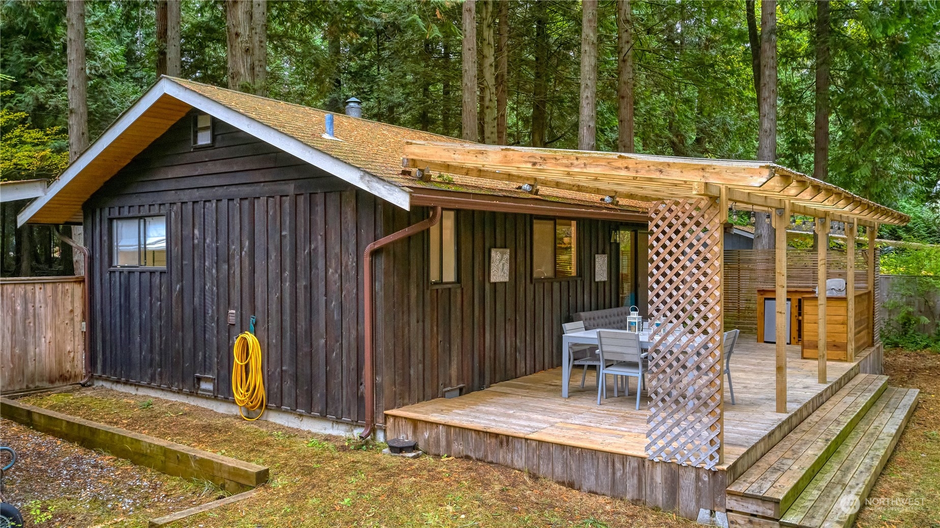 1976 Johnson Road Point Roberts, WA 98281 - Photo 21 of 22 a view of house with patio and outdoor seating