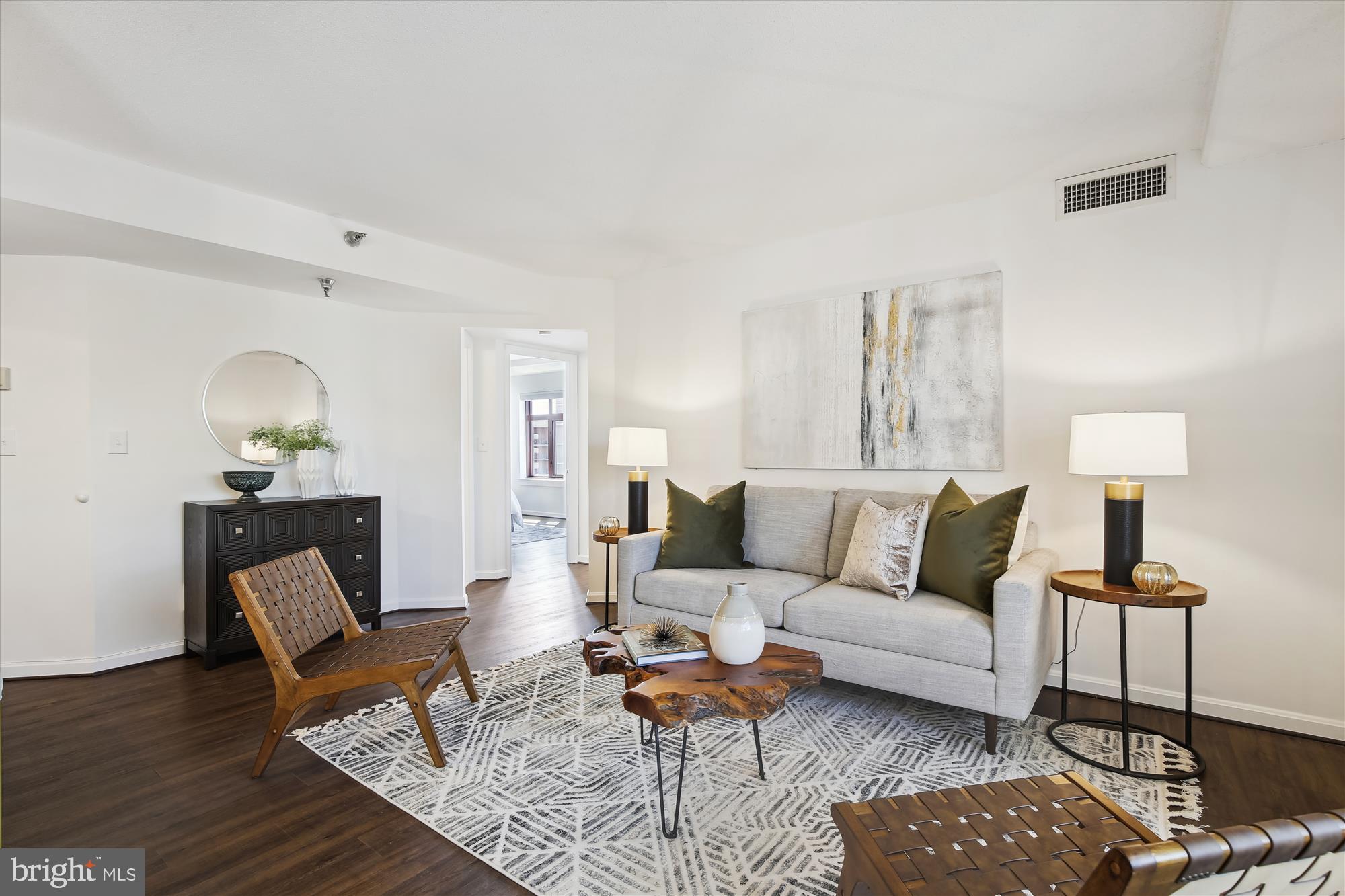 2400 Clarendon Boulevard, Unit 414 Arlington, VA 22201 - Photo 11 of 39 a living room with furniture and wooden floor