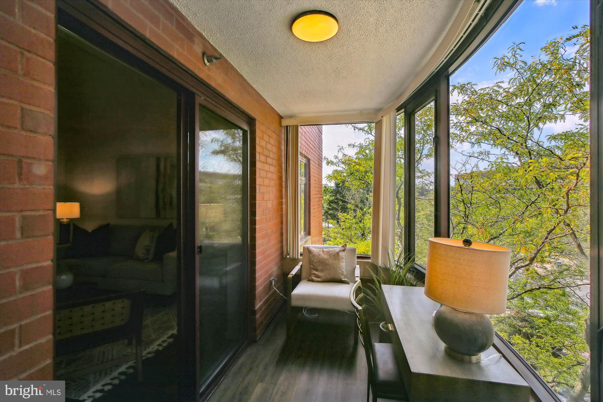 2400 Clarendon Boulevard, Unit 414 Arlington, VA 22201 - Photo 15 of 39 a view of a living room and a window