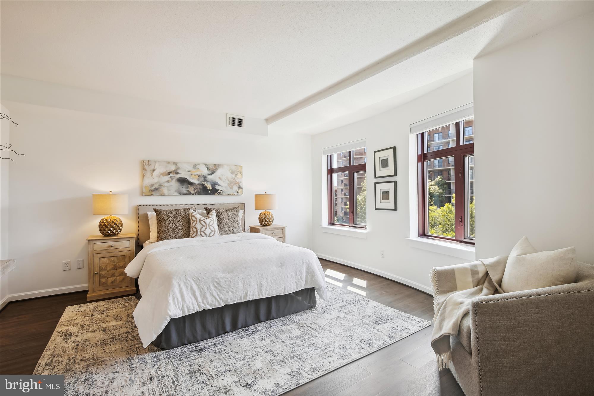 2400 Clarendon Boulevard, Unit 414 Arlington, VA 22201 - Photo 25 of 39 a bedroom with a large bed and a window