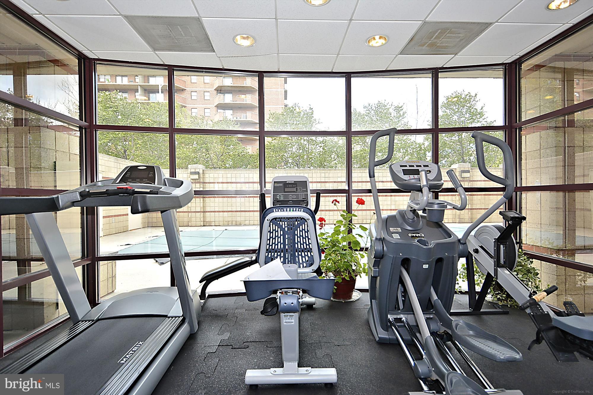 2400 Clarendon Boulevard, Unit 414 Arlington, VA 22201 - Photo 32 of 39 a view of a workspace with furniture and a window