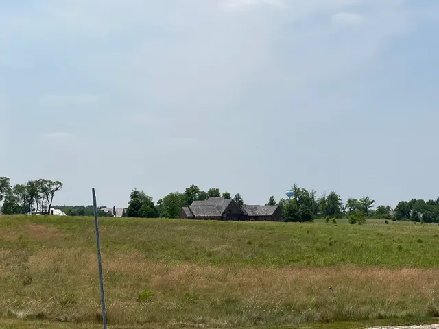 a view of a grassy field