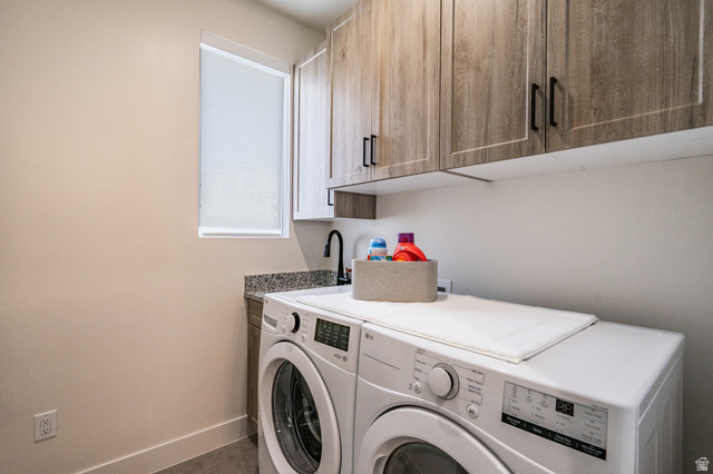 2972 West 570 North Hurricane, UT 84737 - Photo 17 of 104 Laundry area featuring cabinet space and washing machine and clothes dryer