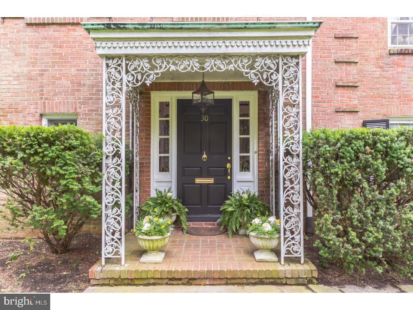 30 Lane Of Acres Haddonfield, NJ 08033 - Photo 2 of 8 front view of a house with potted plants