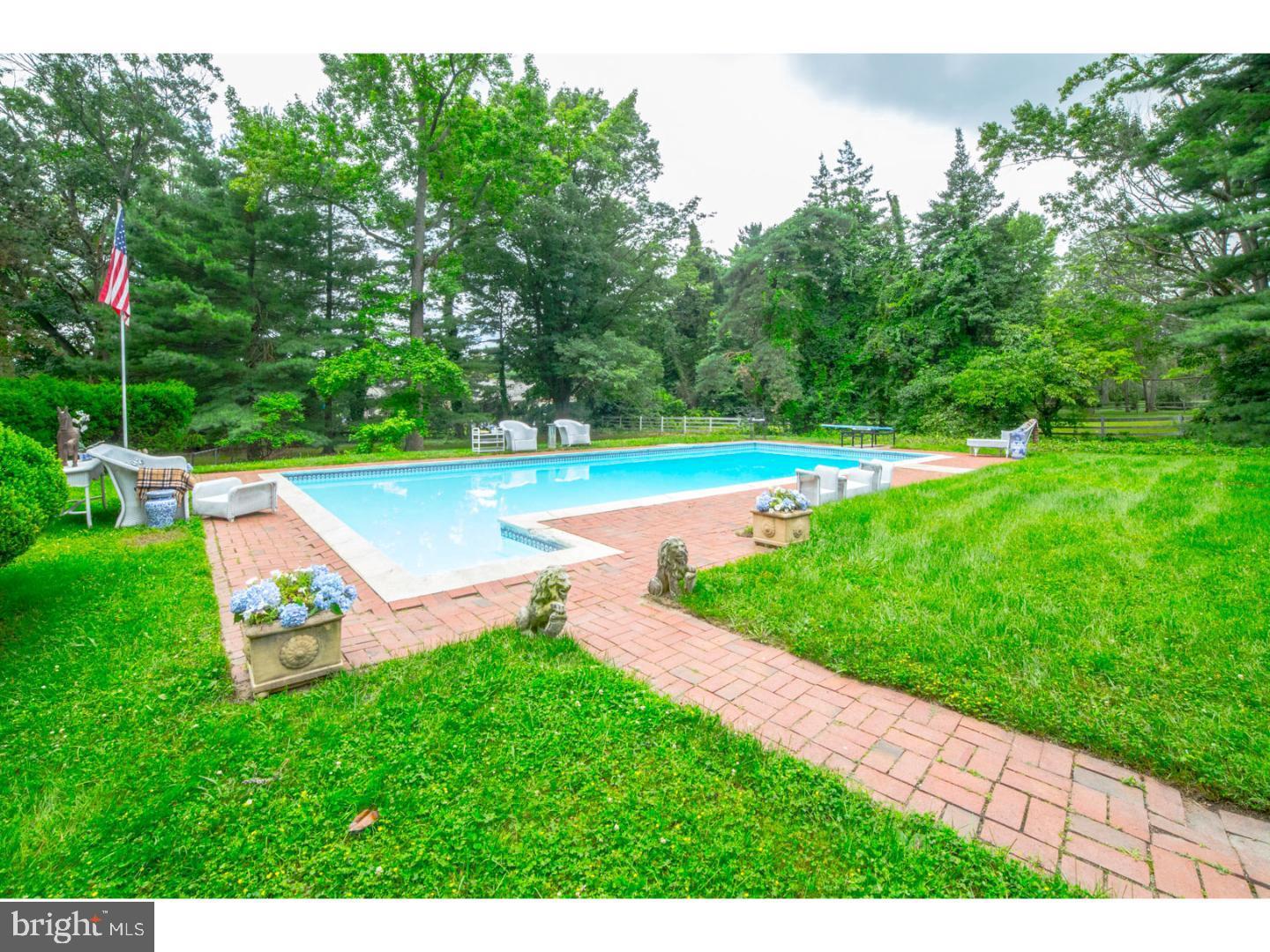 30 Lane Of Acres Haddonfield, NJ 08033 - Photo 6 of 8 a view of a backyard with swimming pool