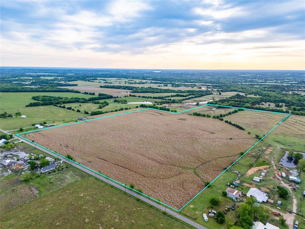 950 Old Ida Road Sherman, TX 75090 - Photo 15 of 15 an aerial view of a houses with a yard and lake