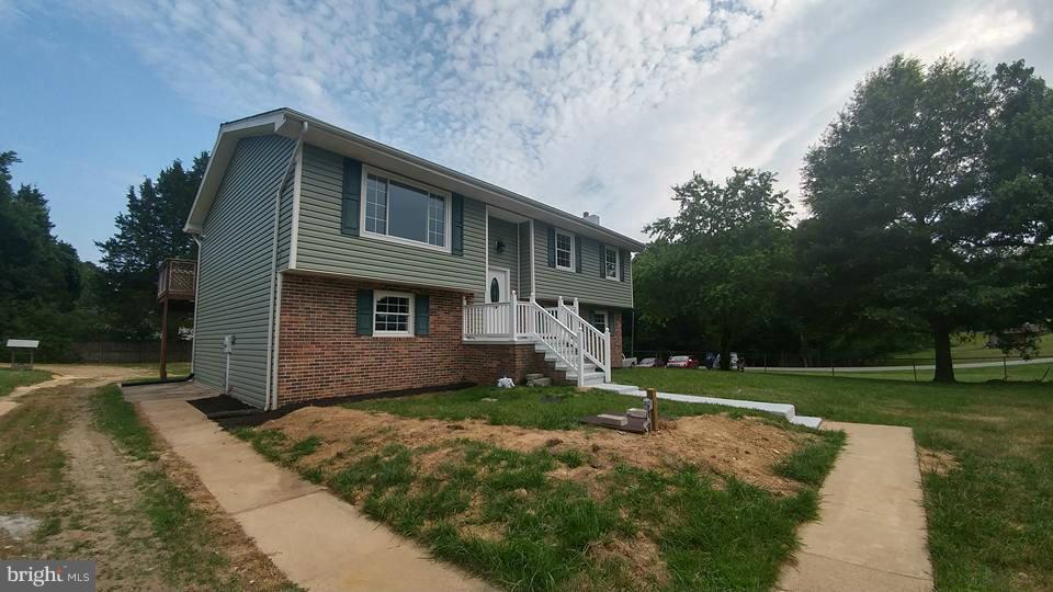 24411 Morgan Road Hollywood, MD 20636 - Photo 28 of 28 a front view of a house with a yard