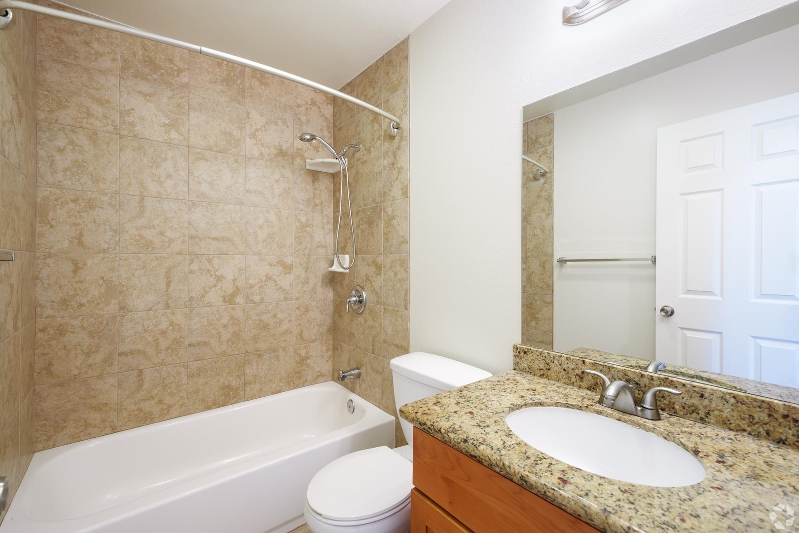 900 Alvarez Avenue Pinole, CA 94564 - Photo 10 of 10 a bathroom with a granite countertop sink toilet and shower