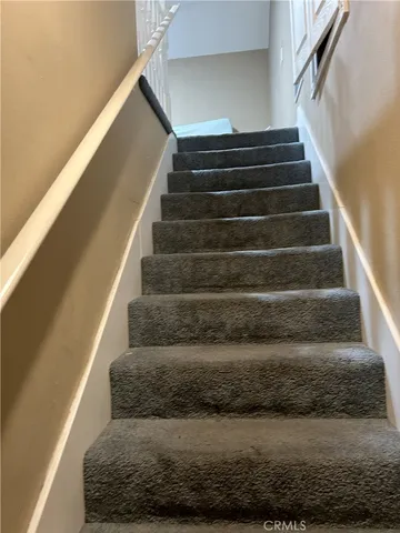 a room with furniture and a window