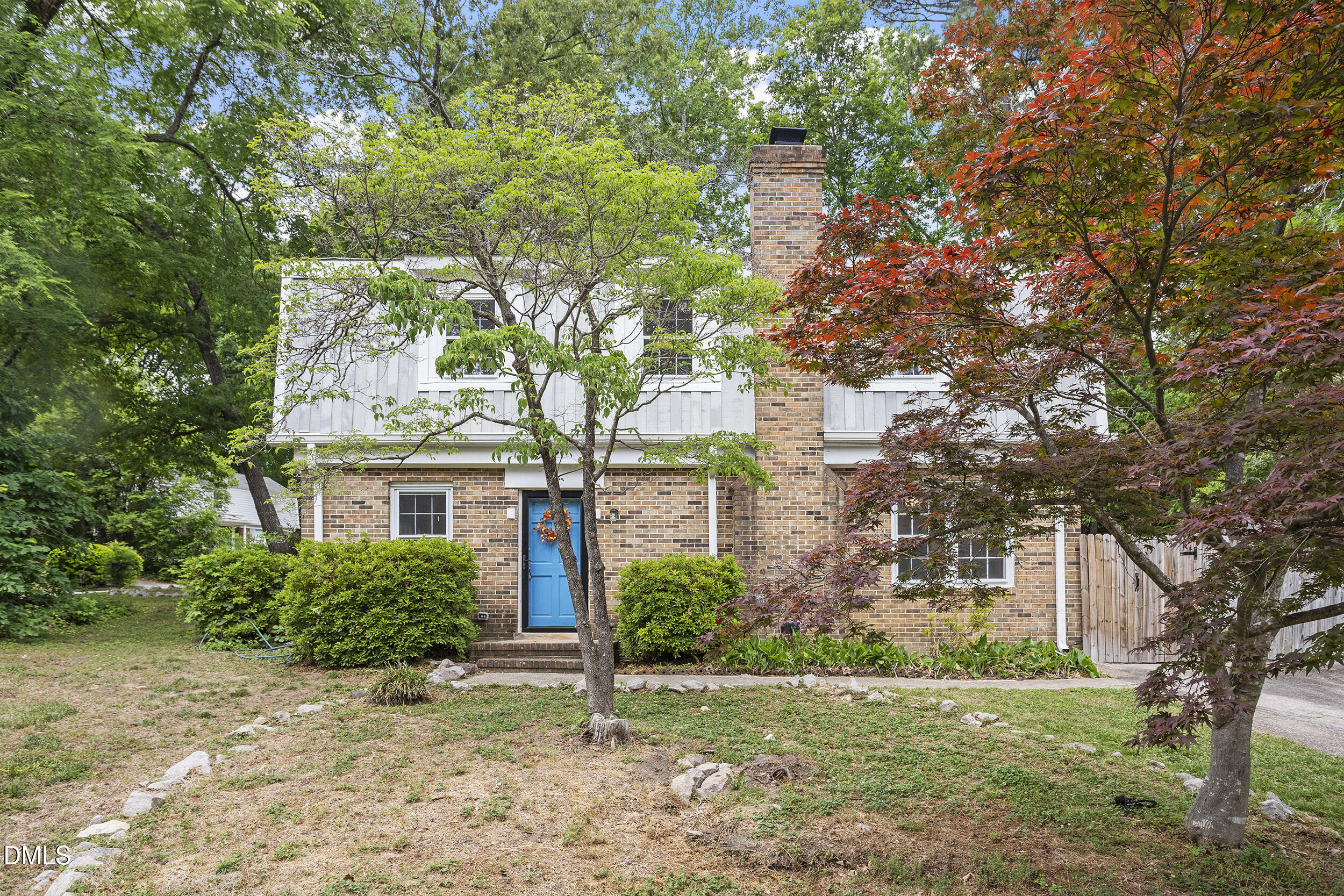 1801 Quail Ridge Road Raleigh, NC 27609 - Photo 26 of 29 a front view of a house with garden