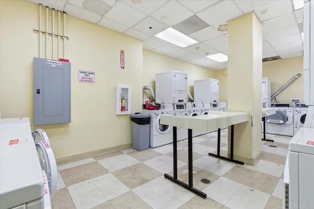 a view of kitchen with table and chairs