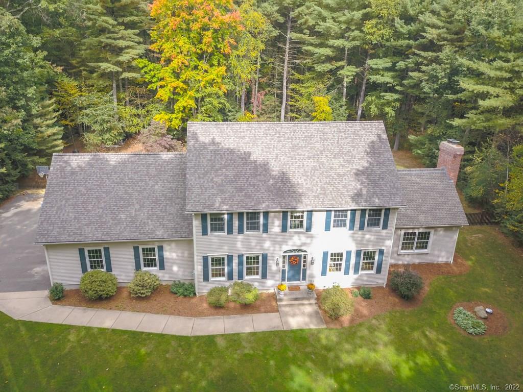 STATELY AND BEAUTIFUL CUSTOM 4 BEDROOM, 2.1 BATH HOME WITH 2 ACRES ON PRIVATE LOT