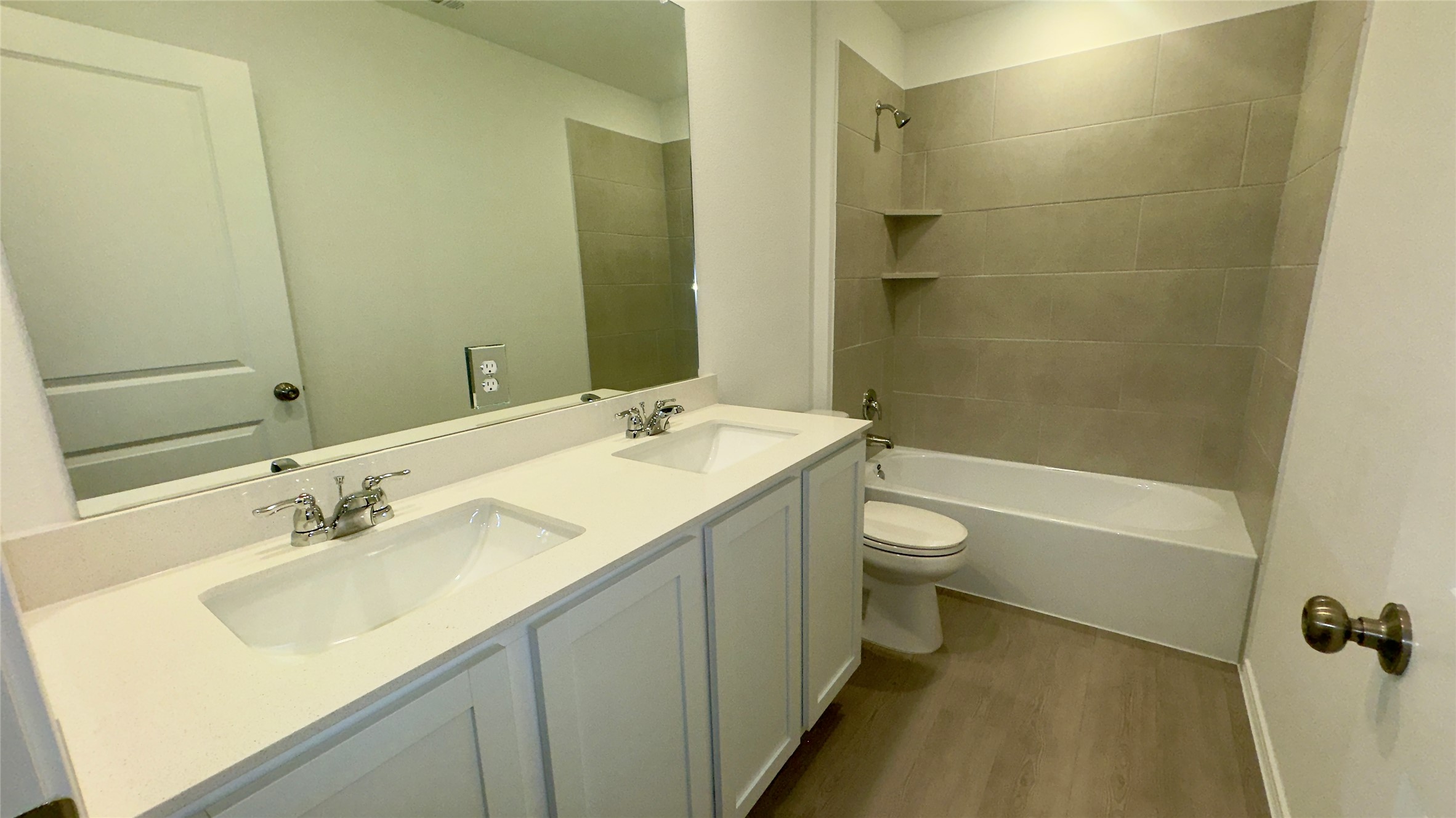 1541 Boggy Crk Rnch Road Georgetown, TX 78628 - Photo 23 of 30 Full bathroom with dark wood-style flooring, shower combination, and double vanity