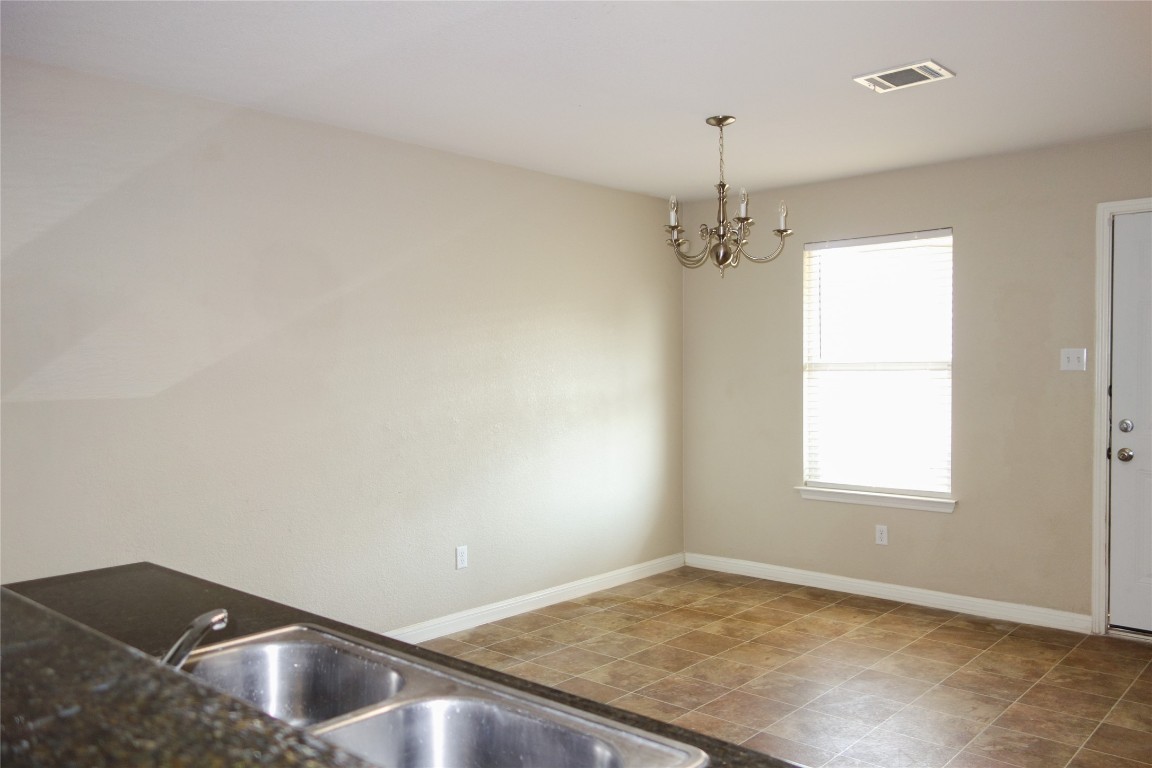 108 Lavaca Loop Hutto, TX 78634 - Photo 12 of 39 a view of a room with window and ceiling fan