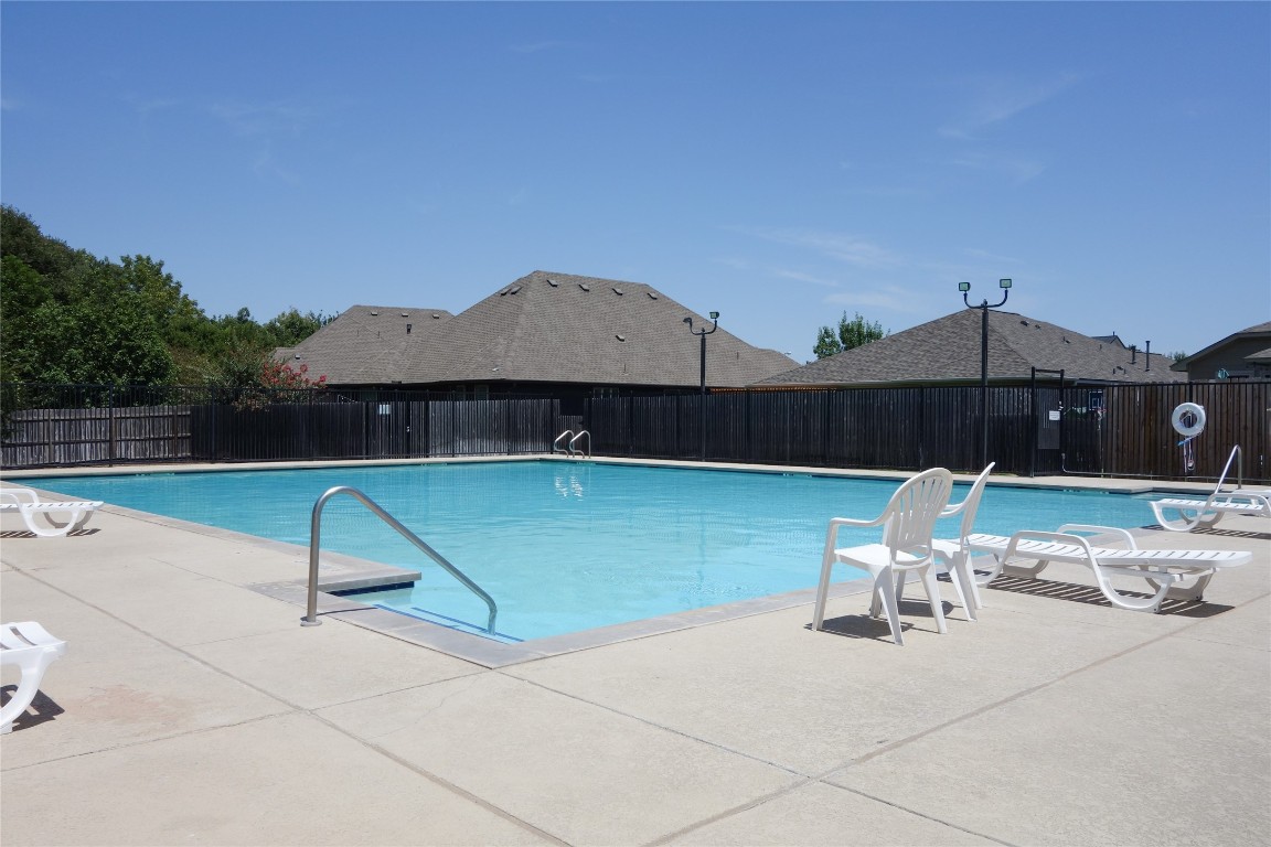 108 Lavaca Loop Hutto, TX 78634 - Photo 37 of 39 a backyard of a house with table and chairs