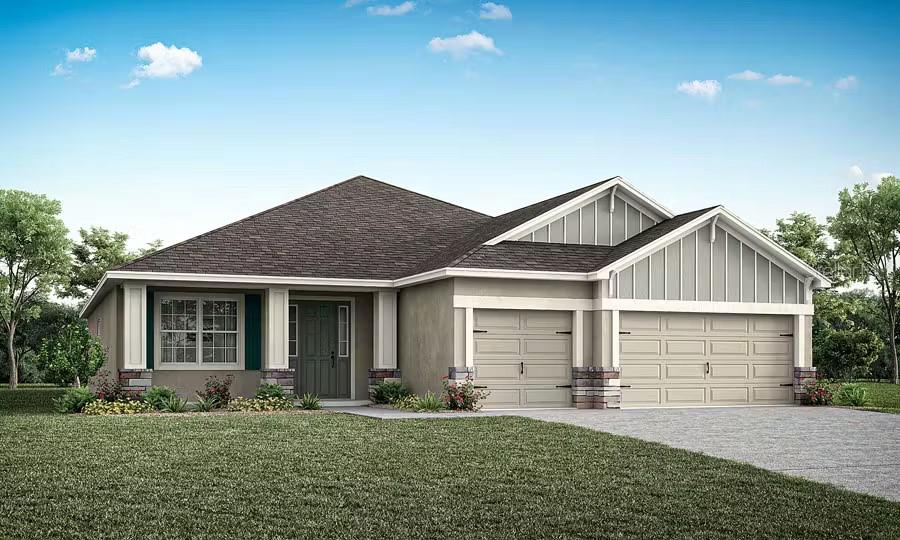 1793 Westerham Avenue St. Cloud, FL 34771 - Photo 1 of 2 a front view of a house with a yard