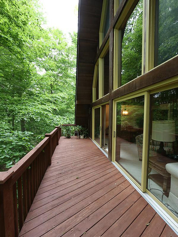 8600 Valley Brook Drive Raleigh, NC 27613 - Photo 3 of 25 Extensive decks to enjoy the scenery - low yard maintenance - new roof 2016. Extensive decks