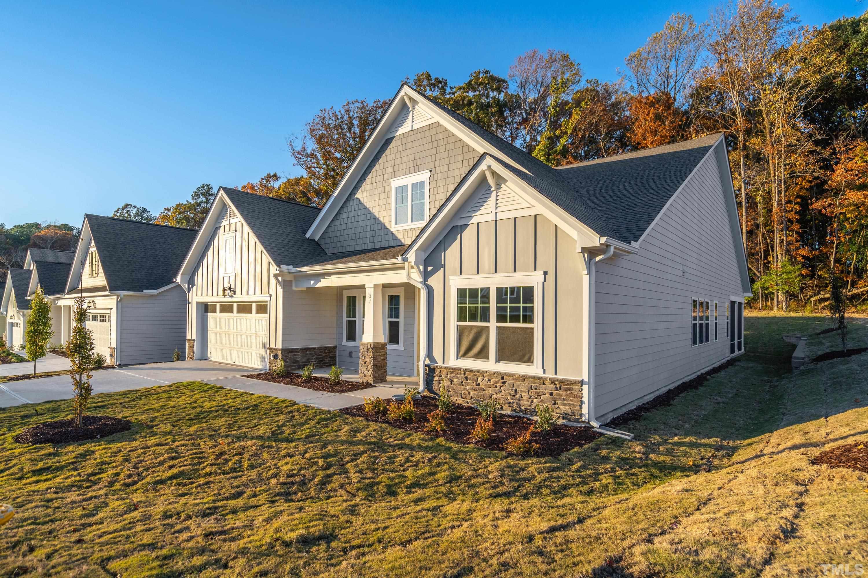 137 English Violet Lane Raleigh, NC 27610 - Photo 2 of 27 a front view of a house with a yard