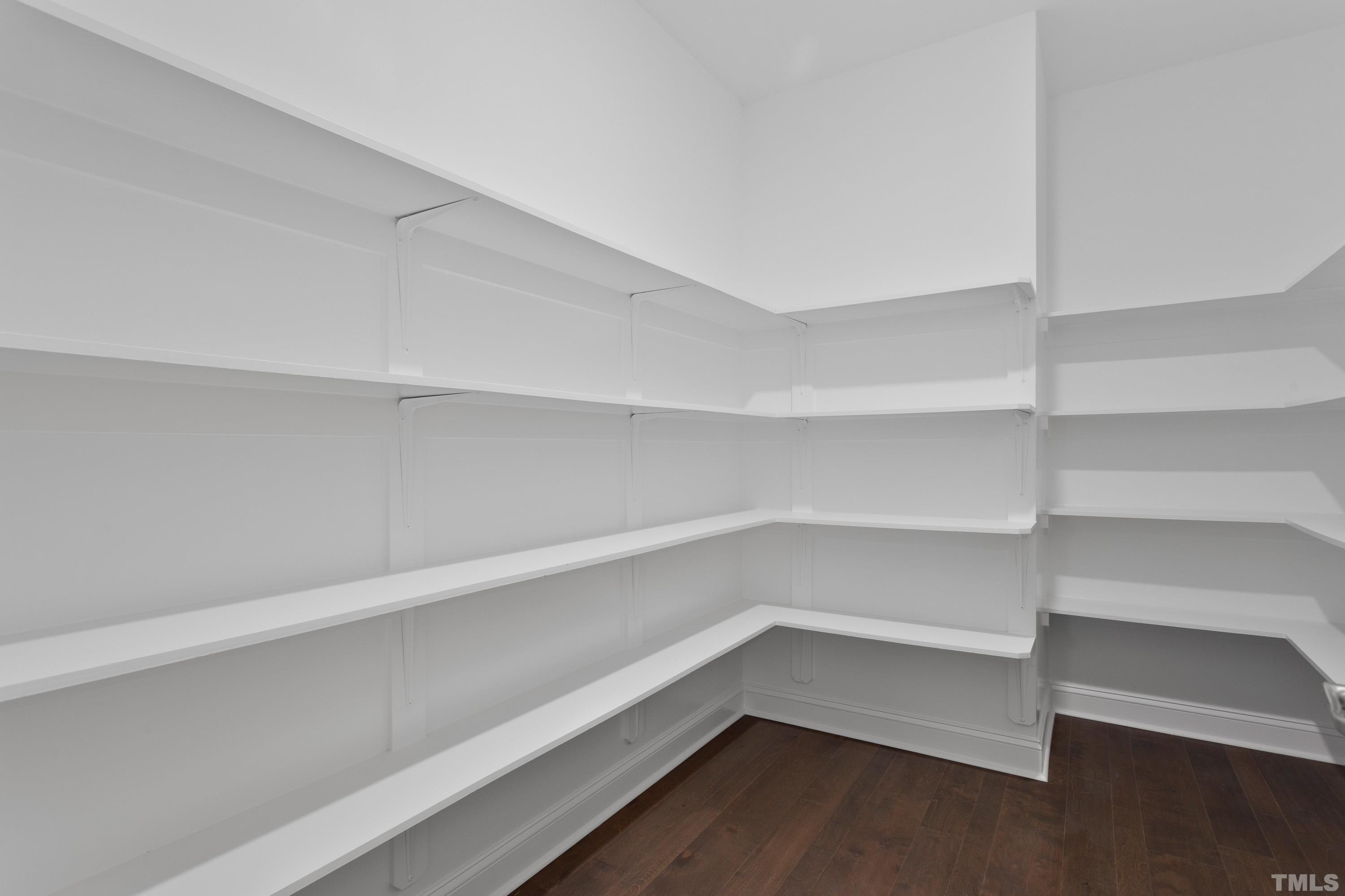 137 English Violet Lane Raleigh, NC 27610 - Photo 14 of 27 a storage room with wooden floor